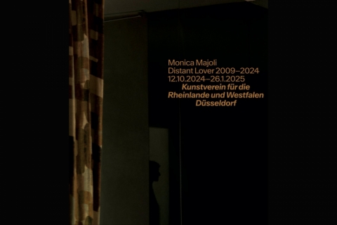 Black background with text for Monica Majoli